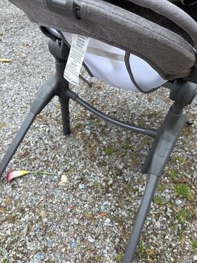 Gray Baby High Chair with White Seat Panel